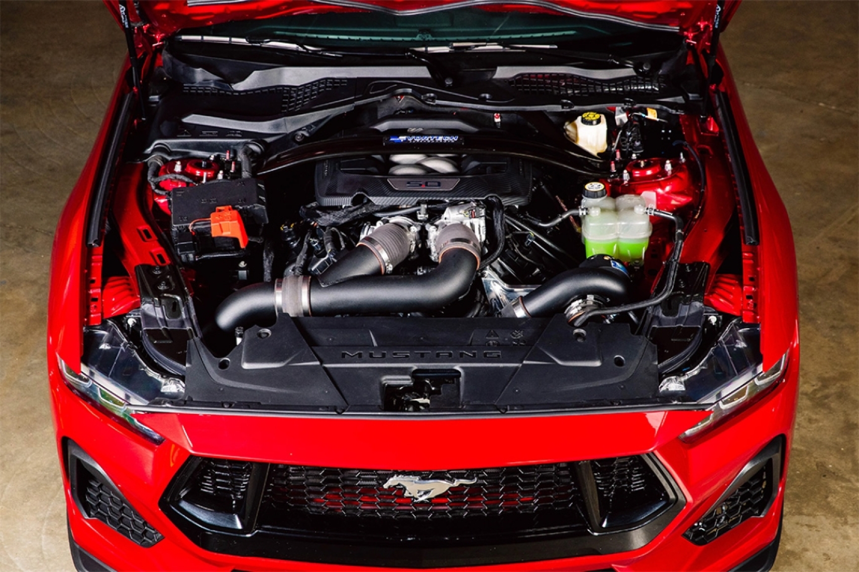Engine bay of a 2024-2026 Ford Mustang GT equipped with a Vortech V-3 JT-Trim supercharger system.